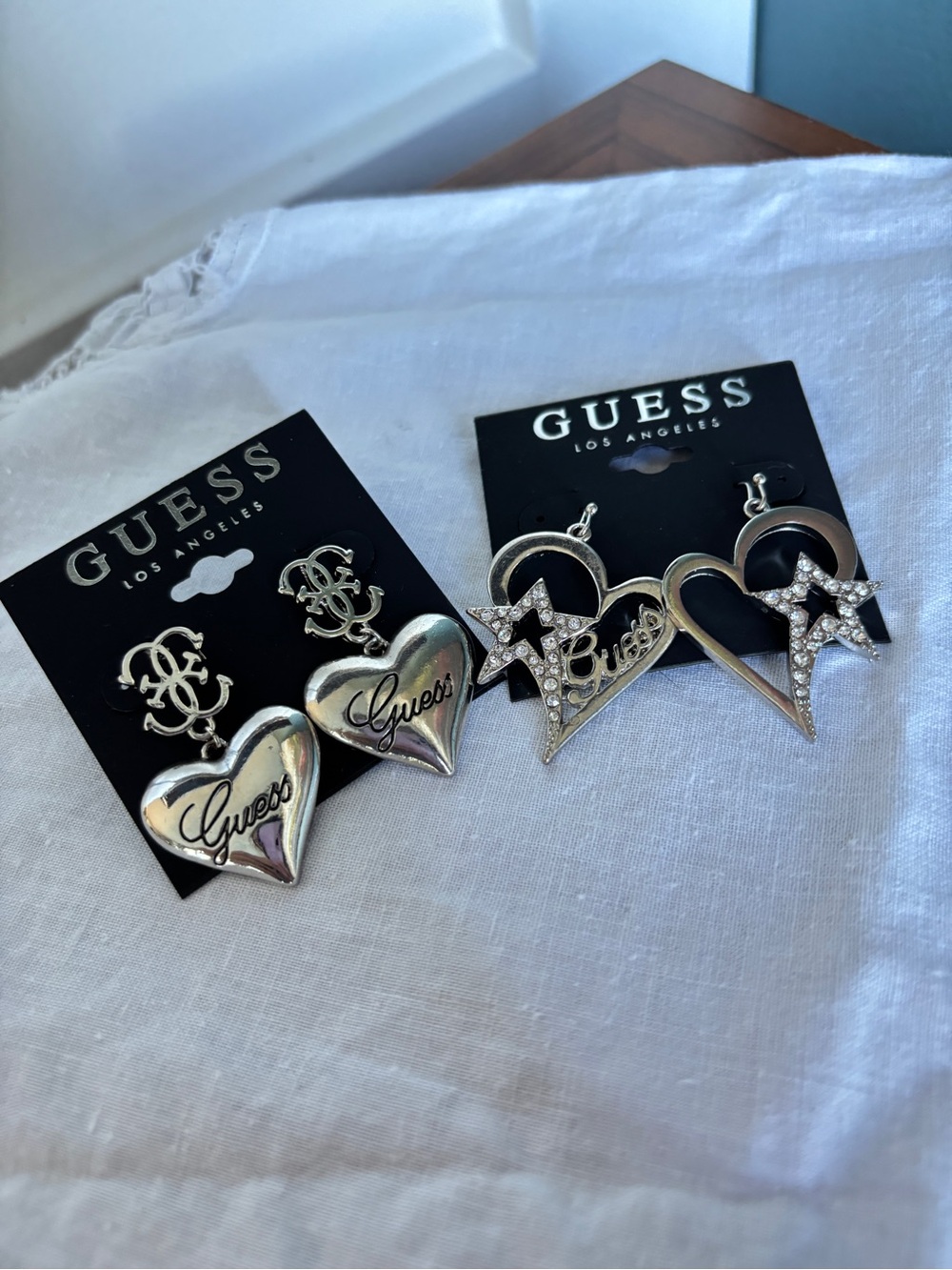 Guess Silver Heart Logo & Crystal Star Heart Dangle Earrings